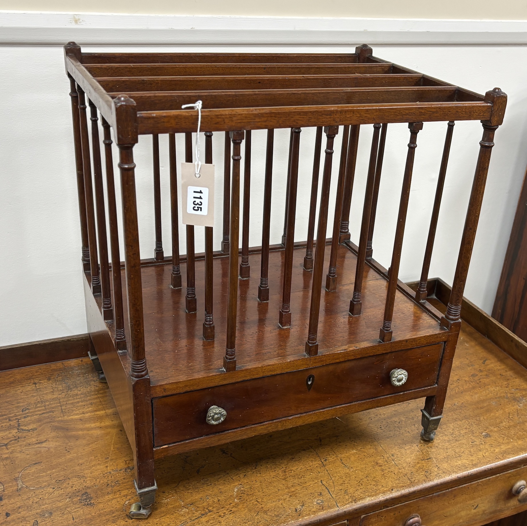 A George III Provincial mahogany four division Canterbury, width 48cm, depth 36cm, height 55cm